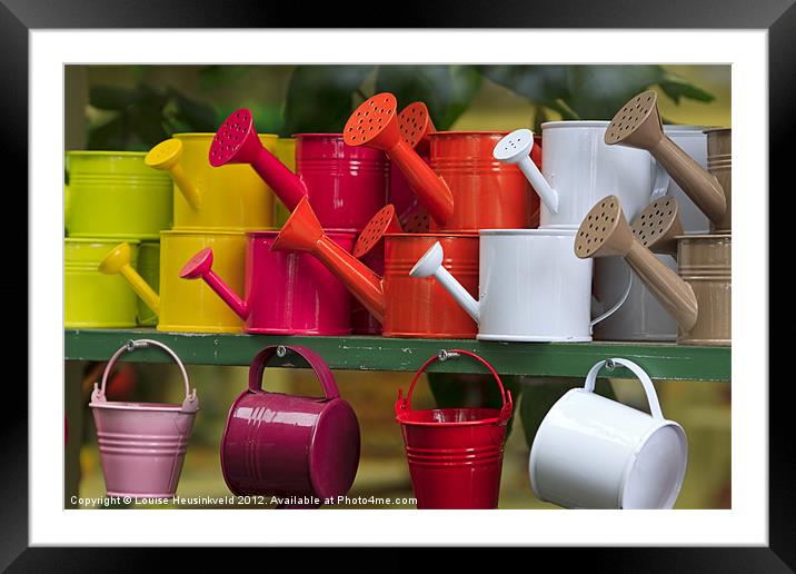 Colourful Watering Cans Framed Mounted Print by Louise Heusinkveld