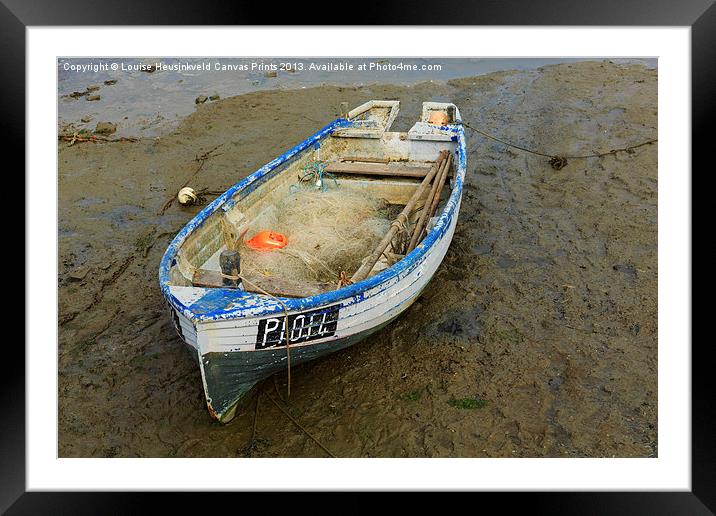 Fishing dinghy at low tide Framed Mounted Print by Louise Heusinkveld