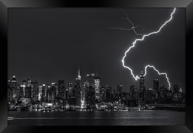 Lightning over New York City Framed Print by Clarence Holmes