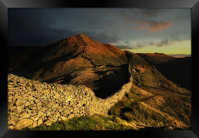 Sunrise over high pike Framed Print by Robert Fielding