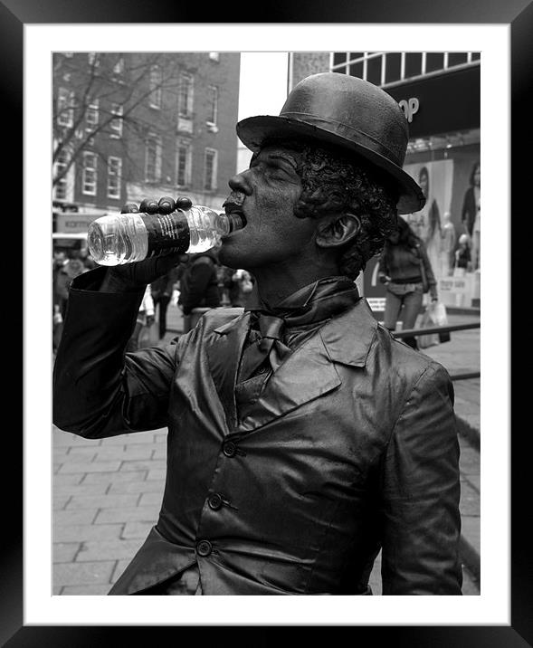 Having a drink Framed Mounted Print by John Boekee