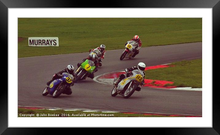 Racing bikes at Snetterton racetrack  Framed Mounted Print by John Boekee