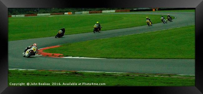 Racing bikes at Snetterton racetrack  Framed Print by John Boekee