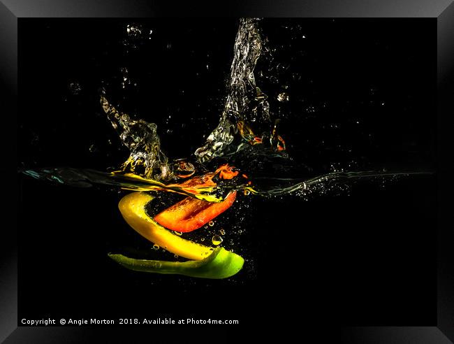 A Splash of Peppers Framed Print by Angie Morton