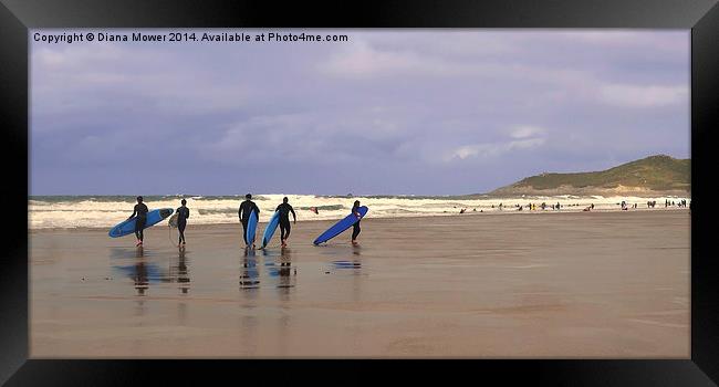Surfers at  Woolacombe beach, Devon Framed Print by Diana Mower