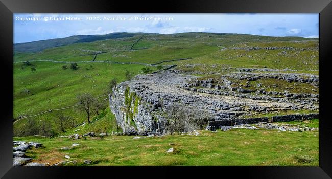 Malham Cove and limestone pavement  Framed Print by Diana Mower