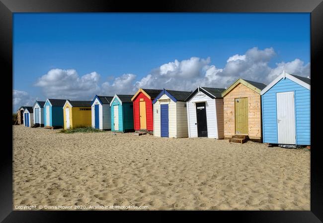Southwold  Beach Huts on the Sand Framed Print by Diana Mower