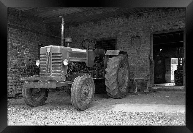 Tractor at home stable Framed Print by Arfabita  