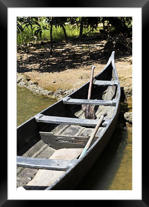 Angled canoe on sandy bank Framed Mounted Print by Arfabita  