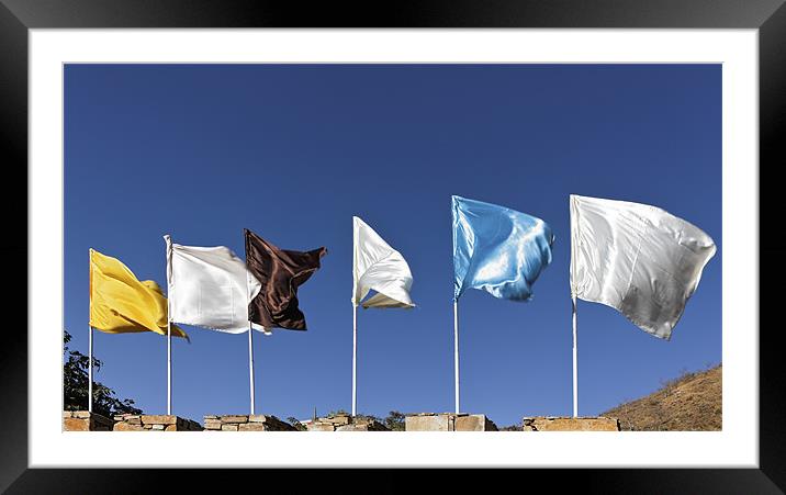 Flags fluttering against blue Sky Framed Mounted Print by Arfabita  