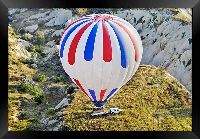 Patriotic Coloured balloon lands on trailer Framed Print by Arfabita  