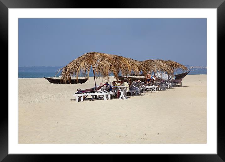 Holidaymakers basking on secluded beach Framed Mounted Print by Arfabita  