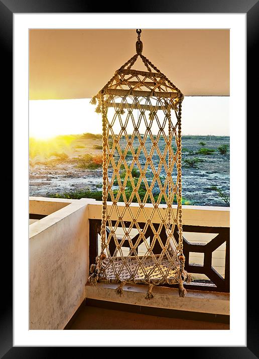 Sunrise hanging on a Rope chair Framed Mounted Print by Arfabita  