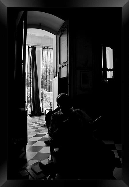 Shadow of a senior man in a old Doorway Framed Print by Arfabita  
