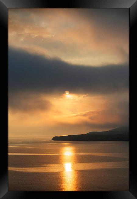 Sunset over Isle Martin Framed Print by Ed Pettitt