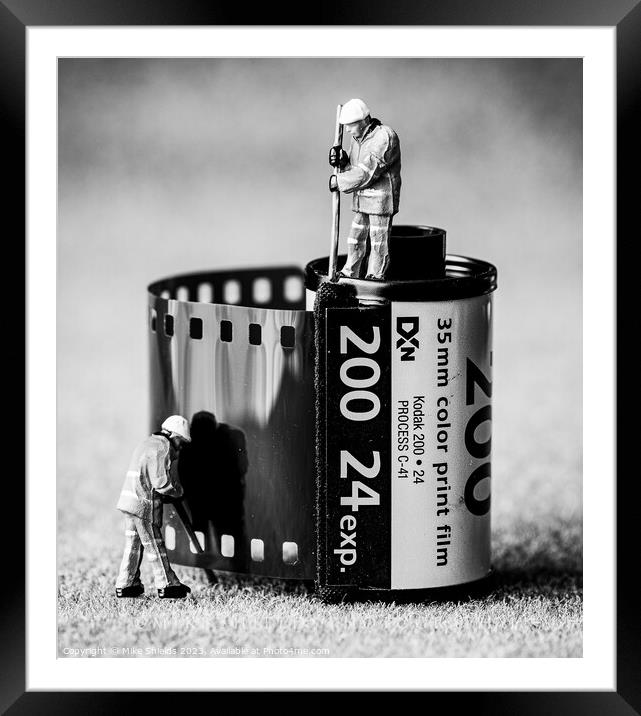 Retrieving Memories: Miniature Film Reel Rewind Framed Mounted Print by Mike Shields