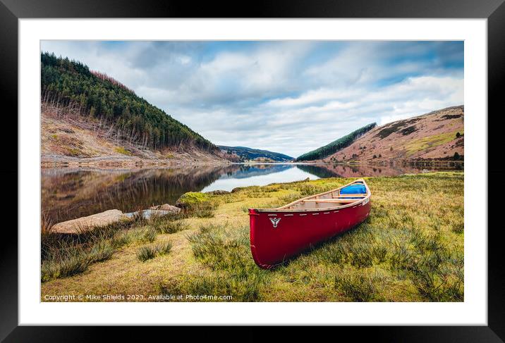 Lakeside Canoe  Framed Mounted Print by Mike Shields