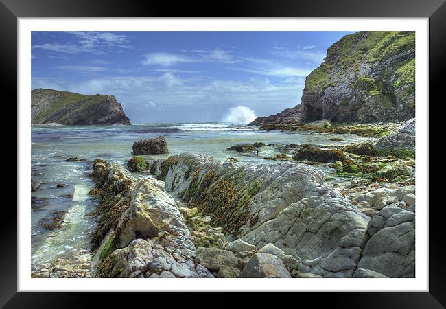 Lulworth Cove Framed Print by Andrew Roland
