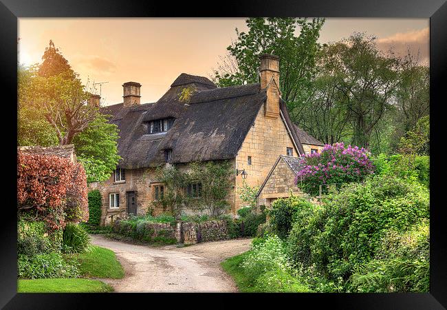Cotswold cottage at sunset Framed Print by Andrew Roland