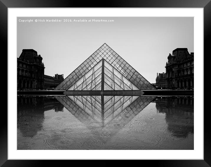 Louvre in the rain. Framed Mounted Print by Nick Wardekker