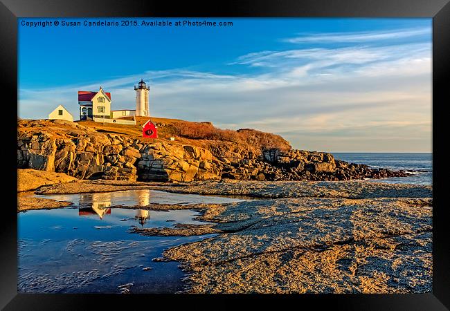 Nubble Lighthouse Reflections Framed Print by Susan Candelario
