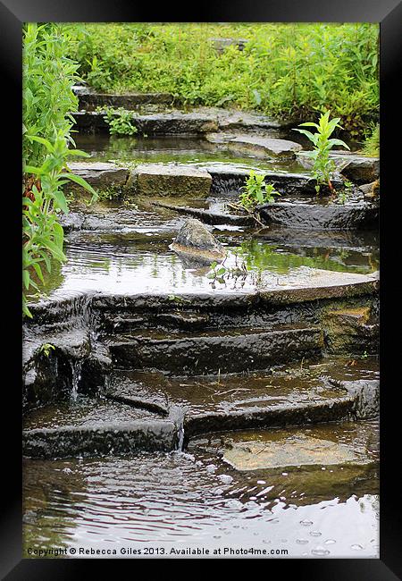 Flowing water Framed Print by Rebecca Giles
