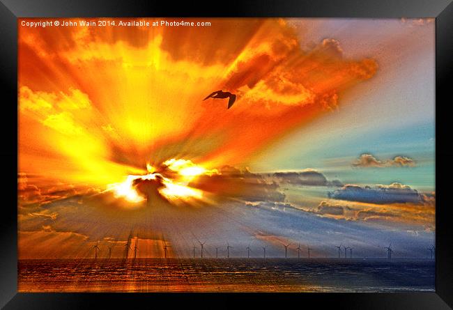 Explosion in the cloud Framed Print by John Wain