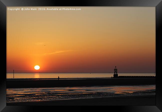 Gormley Sunset Framed Print by John Wain