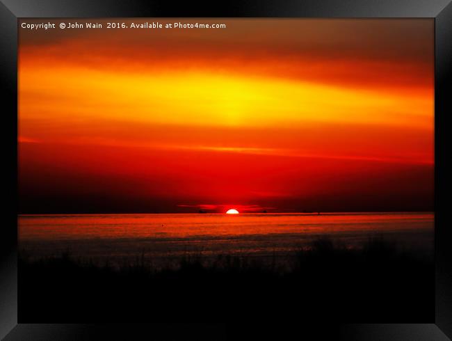 Distant Ships at Sunset Framed Print by John Wain