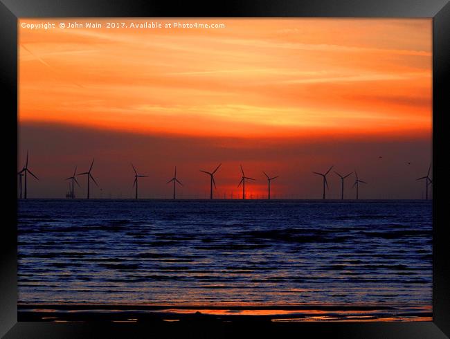 Windmills at Sunset  Framed Print by John Wain