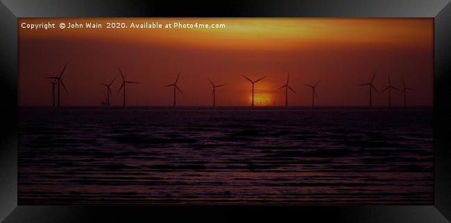 Windmills at Sunset Framed Print by John Wain