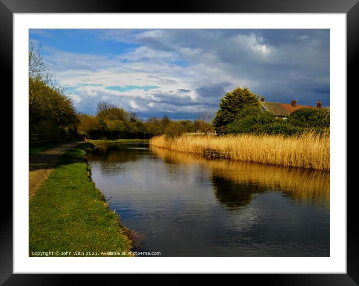 Walk along the canal Framed Mounted Print by John Wain