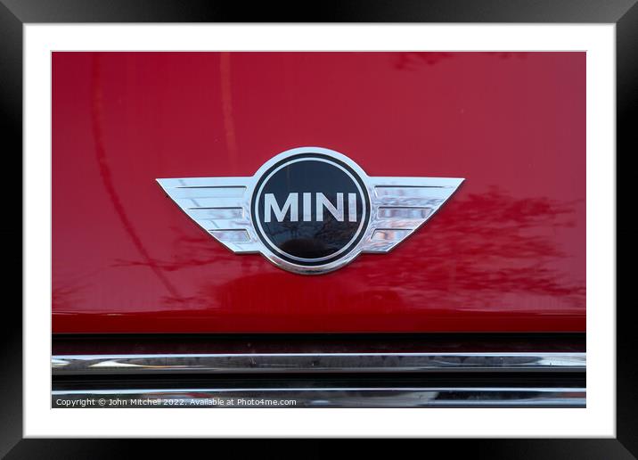 Mini Cooper hood badge Framed Mounted Print by John Mitchell