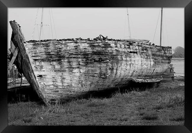 Boat in need of TLC Framed Print by Les Hardman