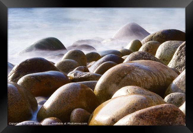 Rocks on the beach at Poerth Navern, Cornwall  Framed Print by Brian Pierce