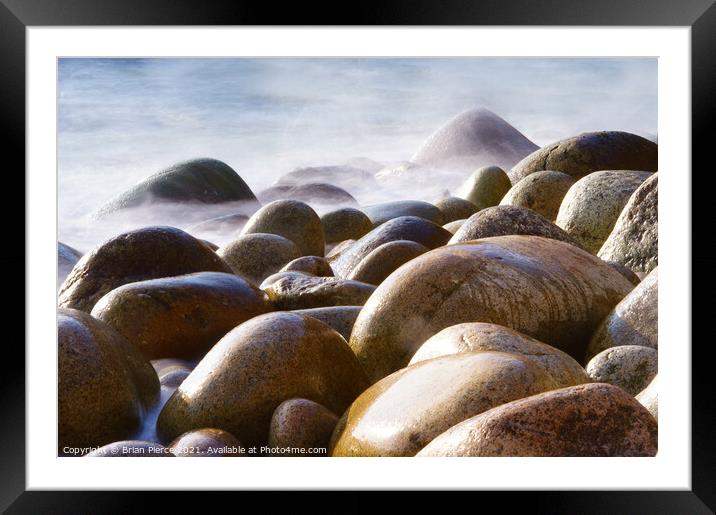 Rocks on the beach at Poerth Navern, Cornwall  Framed Mounted Print by Brian Pierce