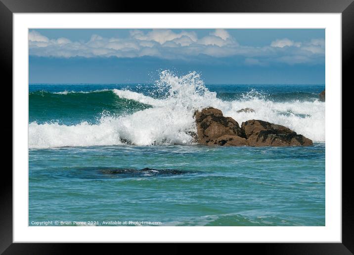 Waves rolling onto a rocky Cornish Beach Framed Mounted Print by Brian Pierce