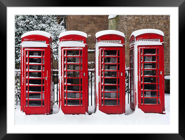 Phone boxes in the snow Framed Mounted Print by Stephen  Hewett