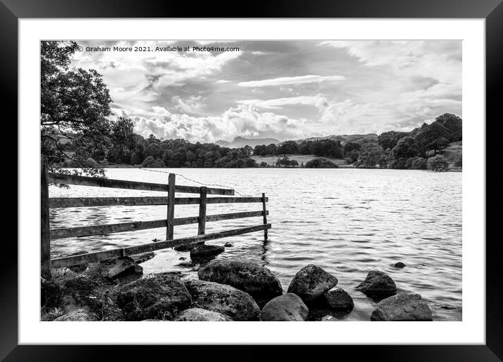 Old fence at Loughrigg Tarn monochrome Framed Mounted Print by Graham Moore