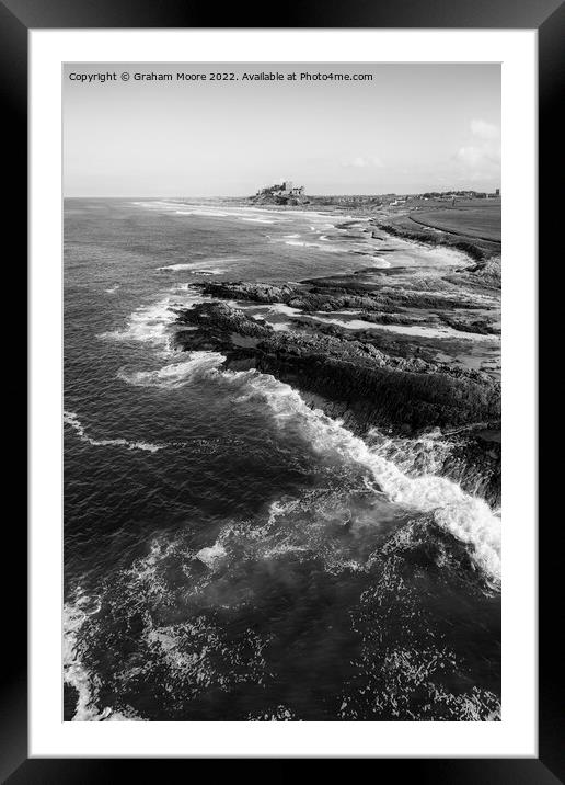 Bamburgh Castle from Harkness Rocks elevated monochrome Framed Mounted Print by Graham Moore