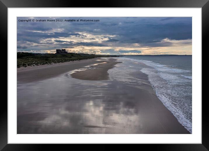 Bamburgh Castle from the south sunset elevated Framed Mounted Print by Graham Moore