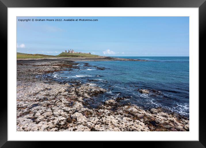 Dunstanburgh Castle from the south elevated Framed Mounted Print by Graham Moore