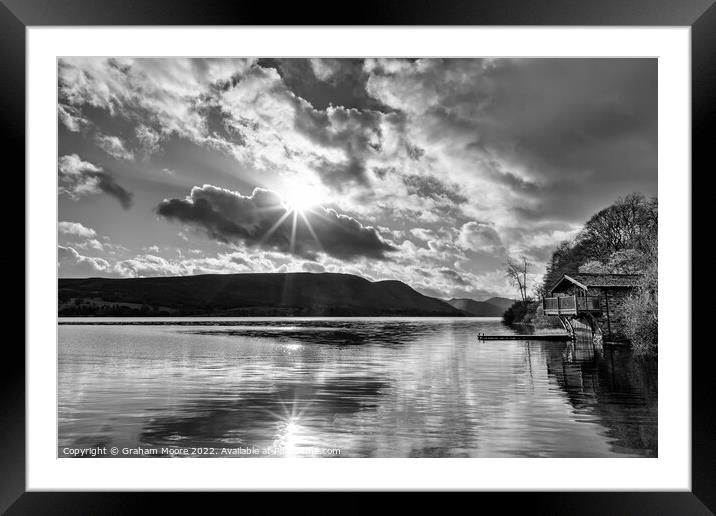 Ullswater boathouse with sun flare monochrome Framed Mounted Print by Graham Moore