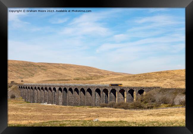 Goods train crossing Ribblehead Viaduct Framed Print by Graham Moore