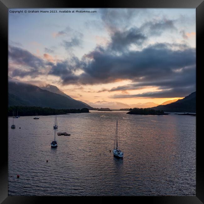 Loch Leven sunset with boats Framed Print by Graham Moore