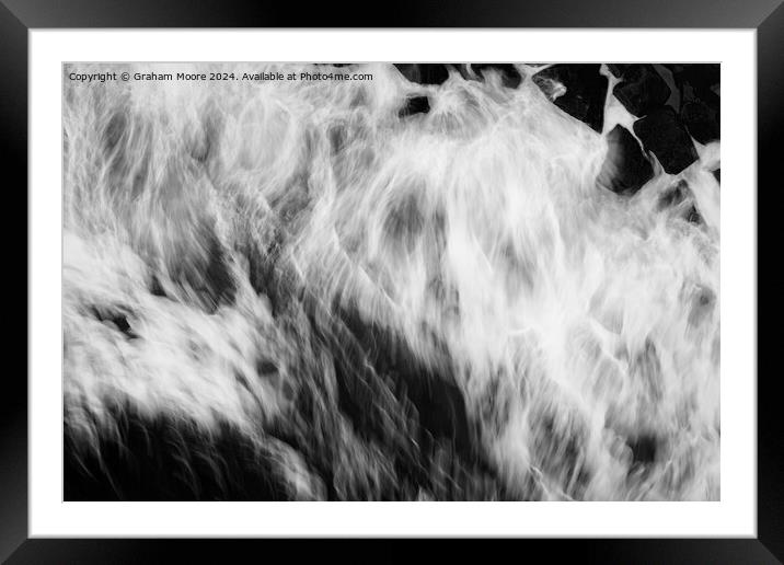 Waves crashing on rocks Framed Mounted Print by Graham Moore