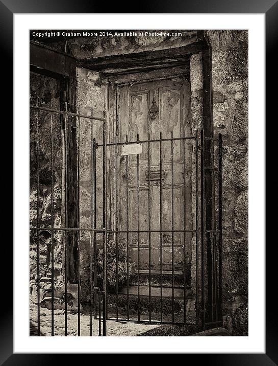 Old doorway Framed Mounted Print by Graham Moore