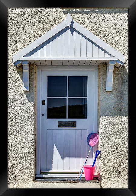 Door with bucket and spade Framed Print by Graham Moore