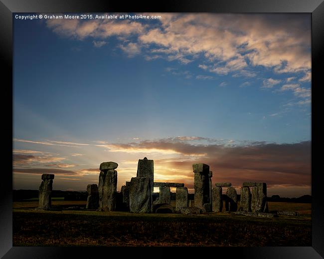 Stonehenge summer solstice sunrise Framed Print by Graham Moore