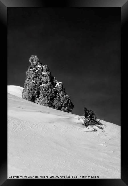 Snow and Rock monochrome Framed Print by Graham Moore
